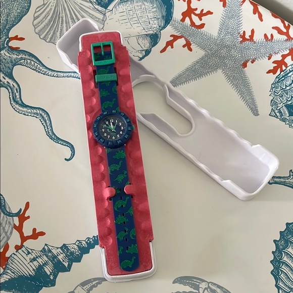 Blue and Green Dinosaur Swatch Watch